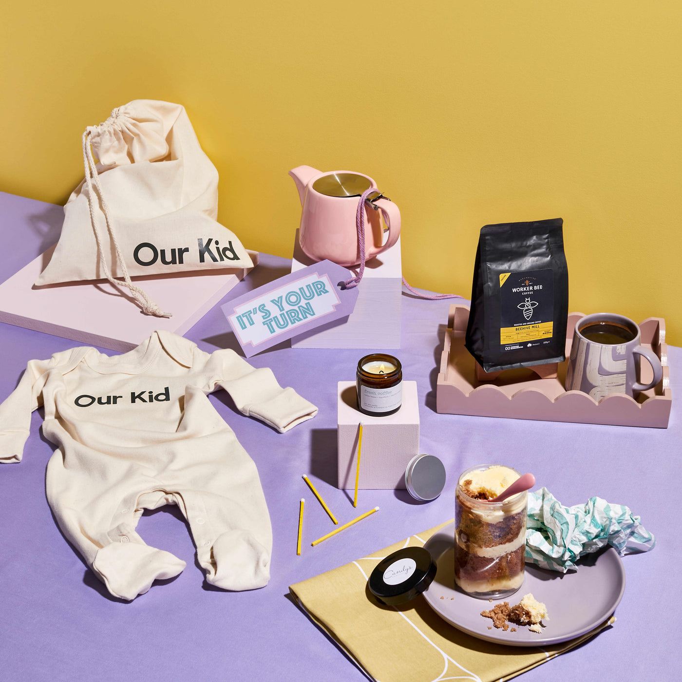Image shows a selection of breakfast inspired gifts for new parents