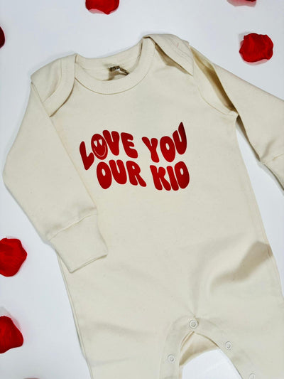 Our Albie ‘Love You Our Kid’ sleepsuit for babies organic cream
